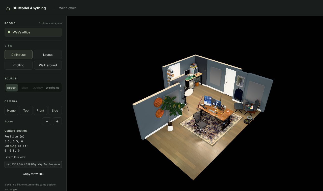 The 3D Model Anything viewer: a dark sidebar with Rooms, View, Source and Camera controls, and a dollhouse view of the office with the two nearest walls cut away, showing the desk on a rug, a lounge chair, a workbench and wall panels.